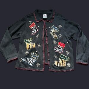 Knit Black Christmas sweater with animal, print stockings #uglychristmassweater